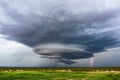 Supercell thunderstorm with lightning bolt. Royalty Free Stock Photo