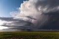 Supercell thunderstorm with lightning and dark storm clouds Royalty Free Stock Photo