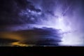 Supercell thunderstorm with lightning and dramatic storm clouds Royalty Free Stock Photo