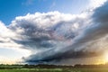 Supercell thunderstorm sunset and the blue sky and cirrus clouds. Royalty Free Stock Photo