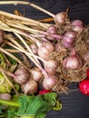 Superfood garlic, radish o wooden table