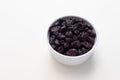 Superfood Heap Of Dried Cranberries In White Bowl On Beige Background. Selective Focus