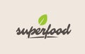 superfood word or text with green leaf. Handwritten lettering