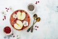 Superfoods smoothie bowl with chia seeds, pomegranate, sliced apples and honey. Overhead, flat lay. Rosh Hashana traditional food Royalty Free Stock Photo