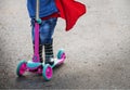 Superhero Baby Boy Using Scooter Adorable Concept