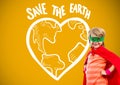 Superhero boy with blank yellow background and Save The earth graphics Royalty Free Stock Photo