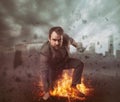 Superhero businessman concept with fire and city background Royalty Free Stock Photo