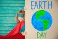 Superhero child. Earth day Royalty Free Stock Photo