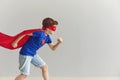 Superhero child. Kids costume. Concept of strength and justicec. Saving world. Royalty Free Stock Photo