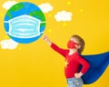 Superhero child wearing protective mask Royalty Free Stock Photo