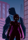 Superhero Couple in City Silhouette