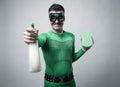 Superhero with detergent and sponge Royalty Free Stock Photo