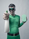 Superhero with detergent and sponge Royalty Free Stock Photo