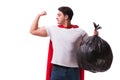 The superhero man with garbage sack isolated on white