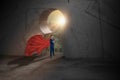 Superhero or superman standing on staircase to keyhole door,with sunlight and opportunity,concept leader vision and new idea, Royalty Free Stock Photo