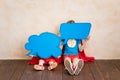 Superheroes children holding speech bubbles blank