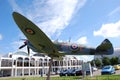 Supermarine Spitfire fighter on display. Clouds and blue sky on background