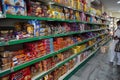 Supermarket aisle of Biscuits, Snacks, Cookies. Various brand biscuits display on the supermarket aisle with selective focus.