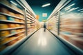 Supermarket aisle with shelves full of products. Shallow DOF