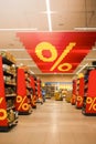 Supermarket Aisles Between Products Displays With Discount Advertising During Sales Period
