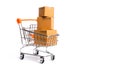 Supermarket cart with boxes, merchandise: the concept of buying and selling goods and services, internet commerce Royalty Free Stock Photo