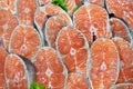 Supermarket fishmonger with fresh salmon Royalty Free Stock Photo