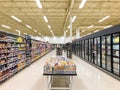 Supermarket - Grocery store with food section aisle - Editorial image