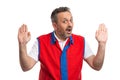 Supermarket employee making innocent gesture and expression