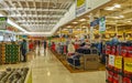 Supermarket from the inside Shelves Goods People Shopping carts Products Royalty Free Stock Photo