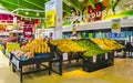 Supermarket from the inside Shelves Goods People Shopping carts Products Royalty Free Stock Photo