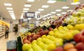 Supermarket interior  filled with the fruit of the shopping cart Royalty Free Stock Photo