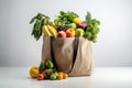 Supermarket paper bag full of healthy food with fruits and vegetables Royalty Free Stock Photo