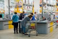 Supermarket people near the cash register