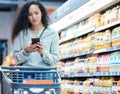 Supermarket, phone and woman shopping, search and on internet for grocery store product, drink or juice. Customer on 5g