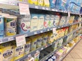 Supermarket shelves with baby formula milk