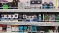 Supermarket shelves with products for men hygiene: after shave, deodorants, perfumes, soap