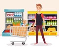 Supermarket shelvings with man buying