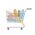 Supermarket shopping cart full of food and drinks Royalty Free Stock Photo