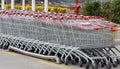 Supermarket shopping carts lined up empty Royalty Free Stock Photo