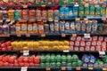 Supermarket store shelf with various brands of healthy sliced bread