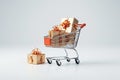 Supermarket trolley full of beautiful gifts on a white background. Shopping concept