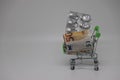 A supermarket trolley full of blister pills, a lot of pills in a wheelbarrow. Concept: home delivery of medicines.Empty