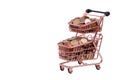 supermarket trolley full of coins for shopping. Concepts of rising prices, purchasing inflation Royalty Free Stock Photo