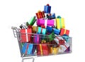 Supermarket trolley full of many multicolored gifts. Royalty Free Stock Photo