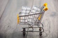 Supermarket trolleys filled with pills