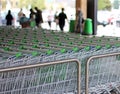 Supermarket trollies outside supermarket