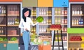 Supermarket woman customer with shopping trolley cart buying vegetables grocery market interior flat horizontal