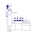 Supermarket woman worker next to boxes with groceries