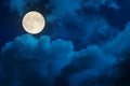 Supermoon in dramatic clouds Royalty Free Stock Photo