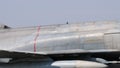 Supersonic interceptor fighter jet and bomber takes off. Close-up follow shot